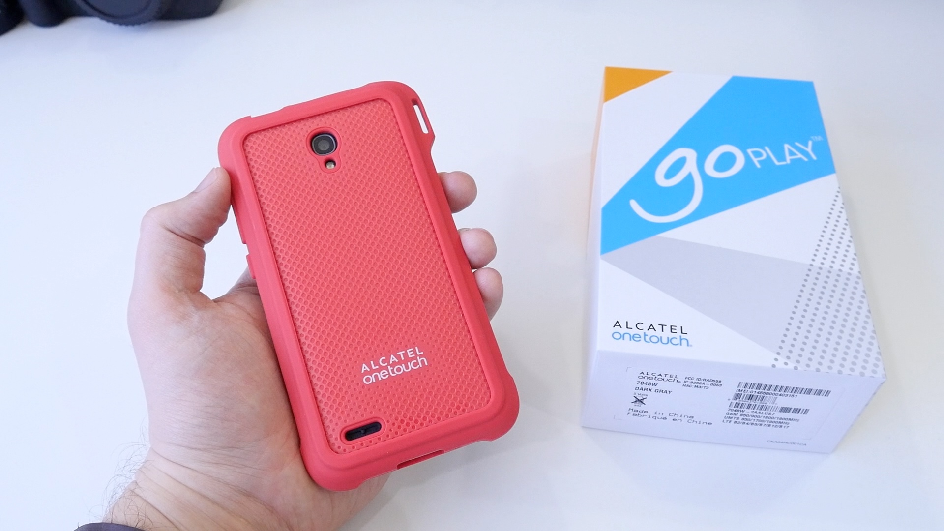alcatel one touch bouncing balls in right hand corner