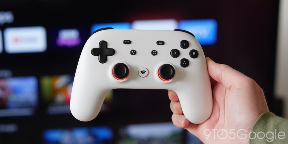 Stadia controller in front of an Android TV
