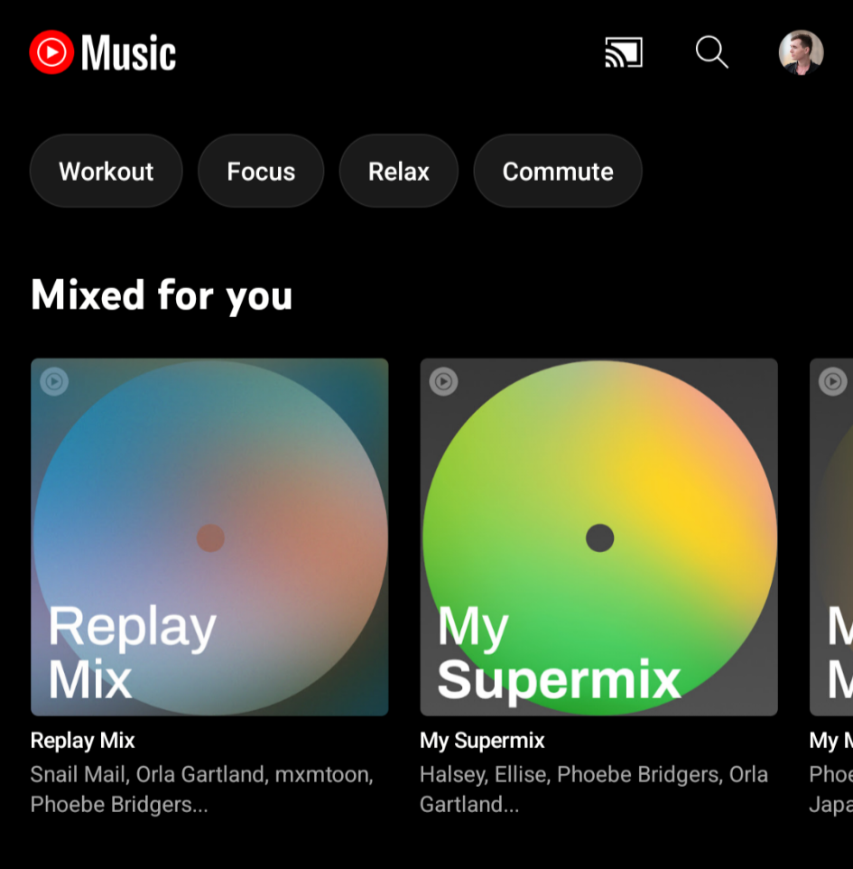 A screenshot of YouTube Music's homepage showing the Replay Mix playlist in the top carousel.