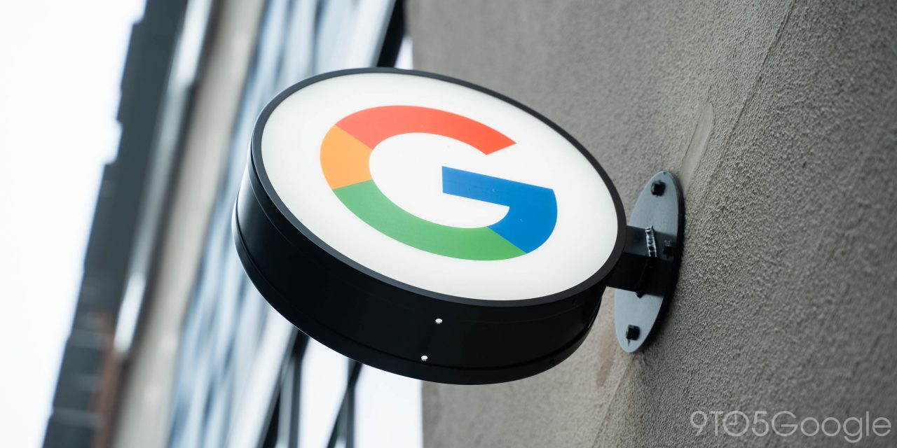 Google logo sign hanging outside Google Store NYC