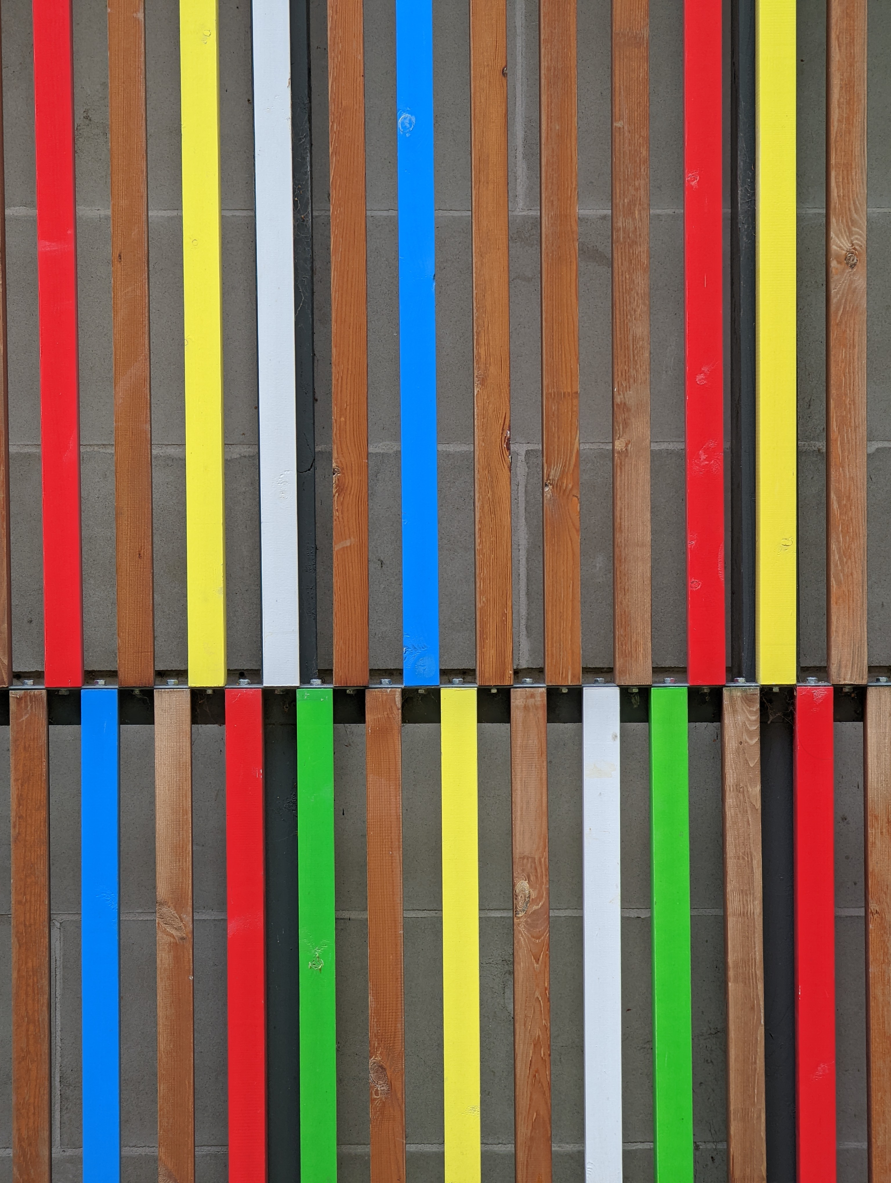 Google Pixel 6 Pro sample image of colored wooden slats attached to a building