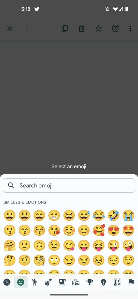 Google Messages allowing you to "Select an emoji" to use as a reaction